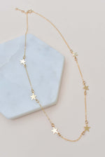 GOLD STAR CHOKER NECKLACE