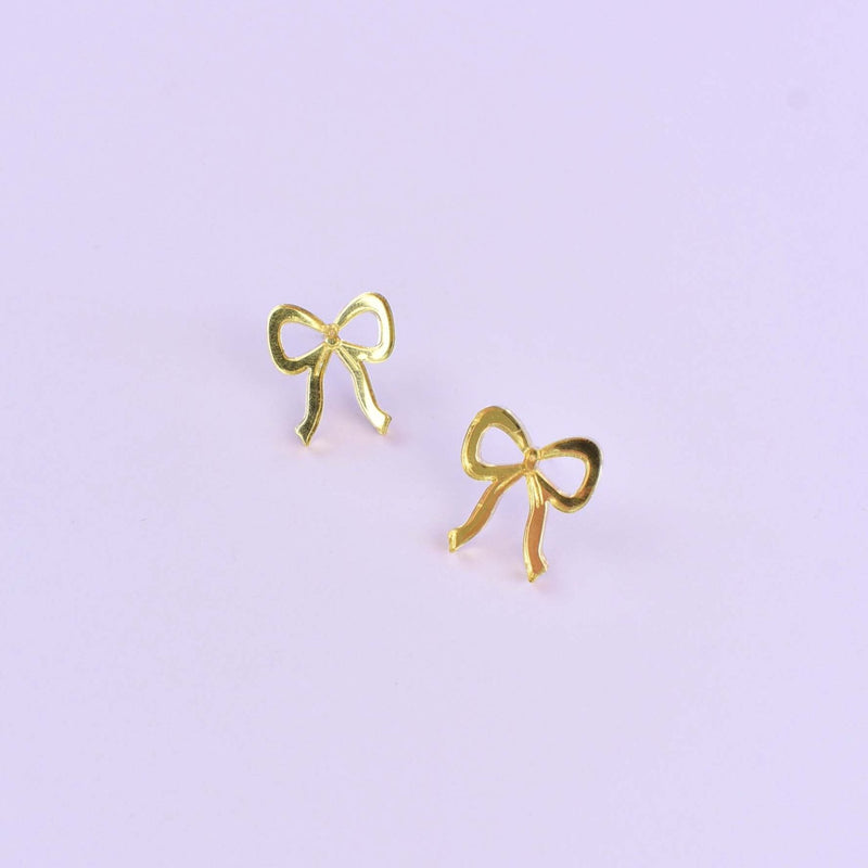 gold bow stud acrylic earrings