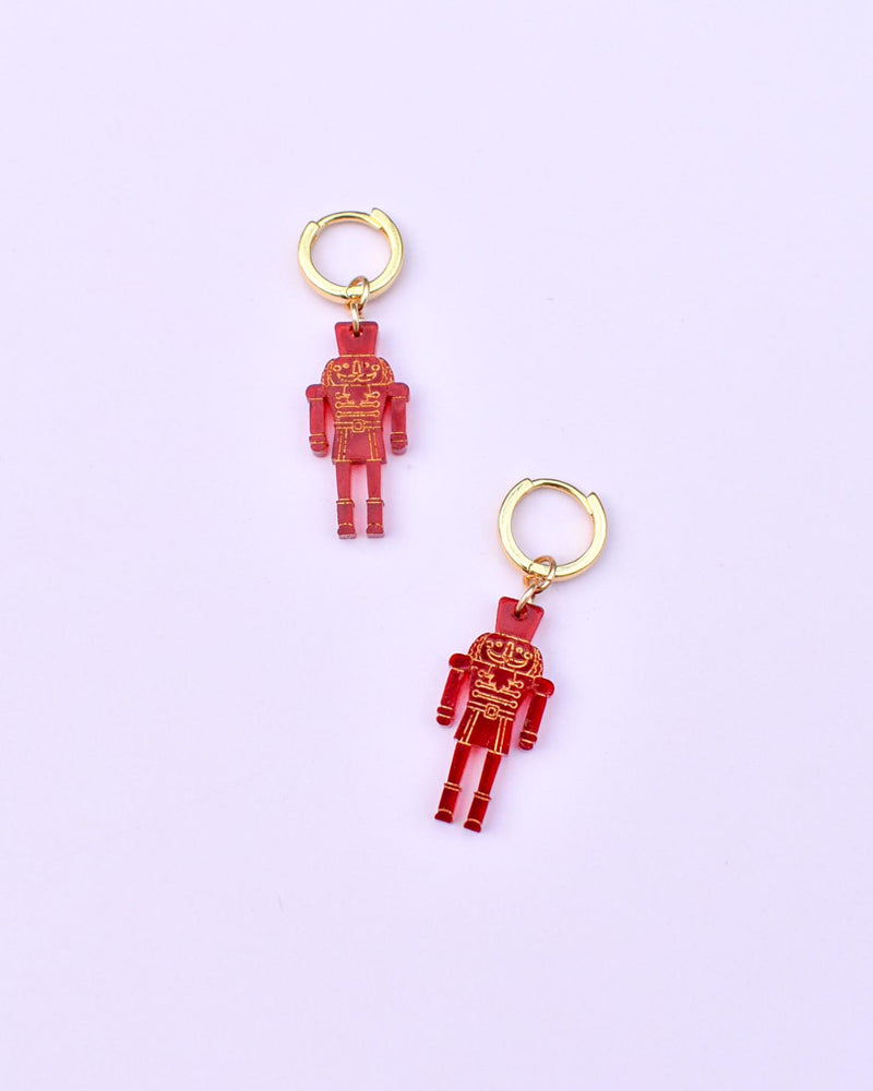 NUTCRACKER CHARM HUGGIES