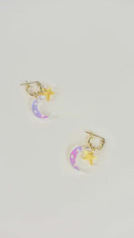 moon and star huggy gold hoop earrings