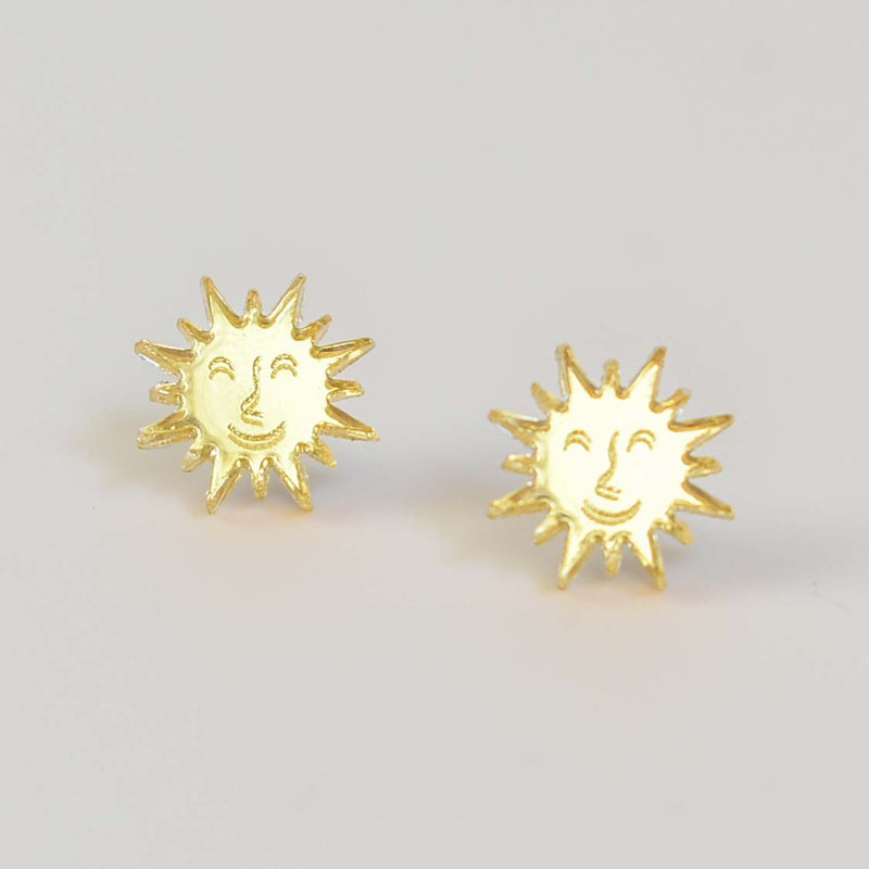 golden acrylic sun shape stud earrings 