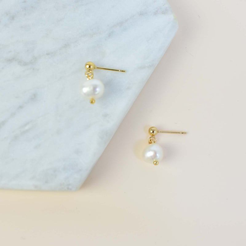 gold pearl studs