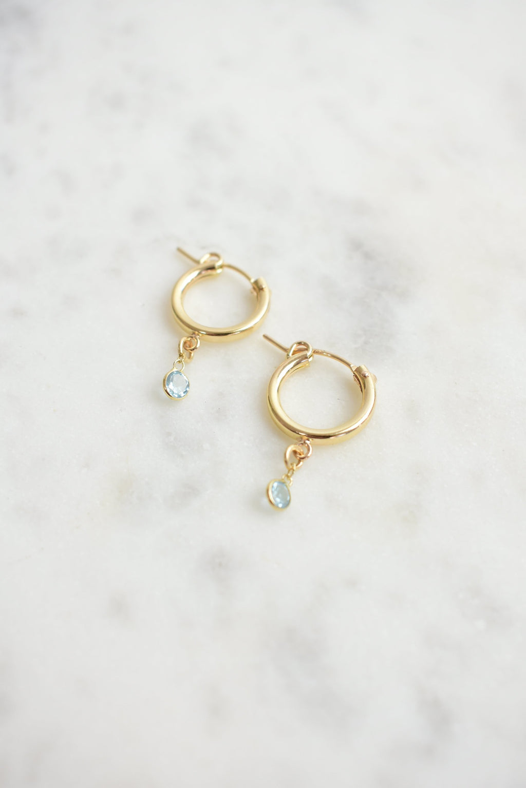 blue topaz dainty huggie hoops